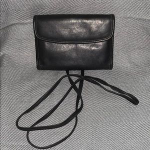 Authentic Coach cross body wallet.